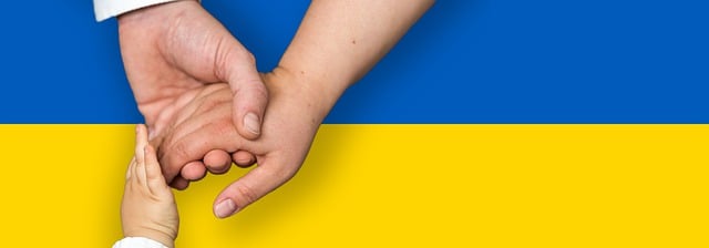 tps ukraine family hugging